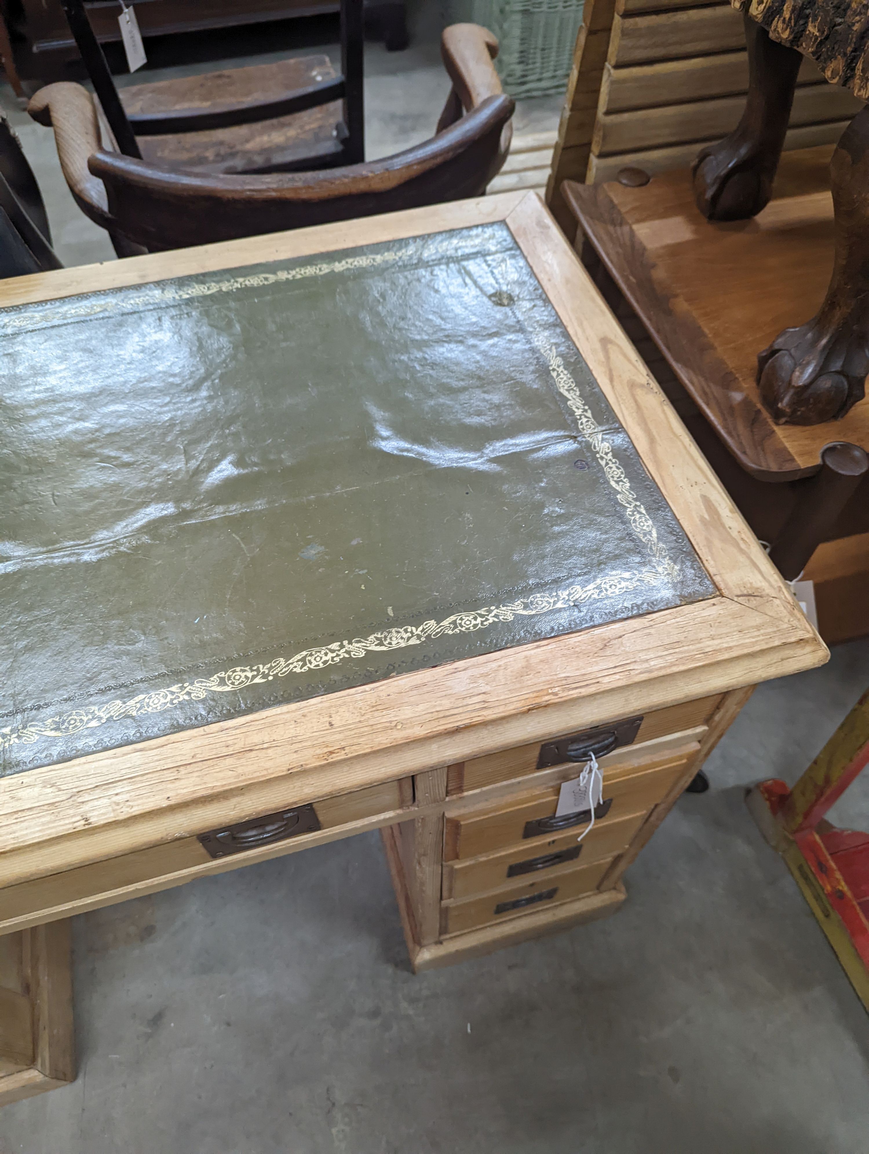 A late Victorian military style pine kneehole desk, width 102cm, depth 55cm, height 75cm
